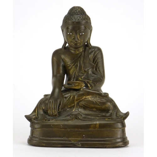 328 - Chino Tibetan patinated bronze figure of seated Buddha, 18.5cm high