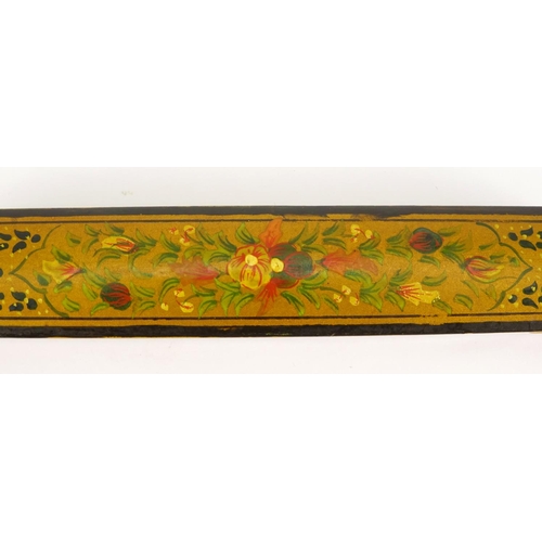 406 - Middle Eastern lacquered Qalamdan, hand painted with flowers and foliage, 22cm in length