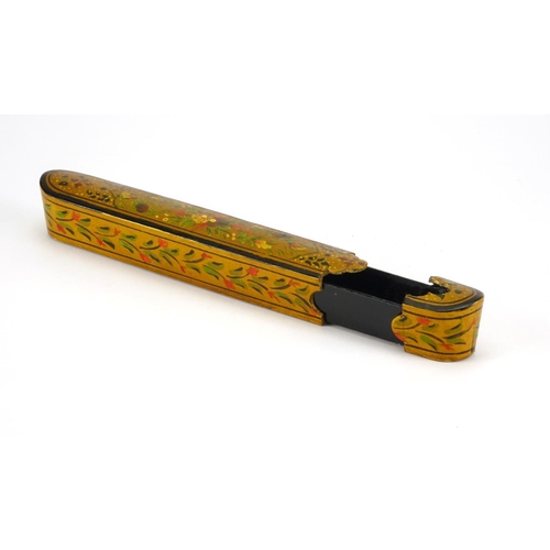 406 - Middle Eastern lacquered Qalamdan, hand painted with flowers and foliage, 22cm in length