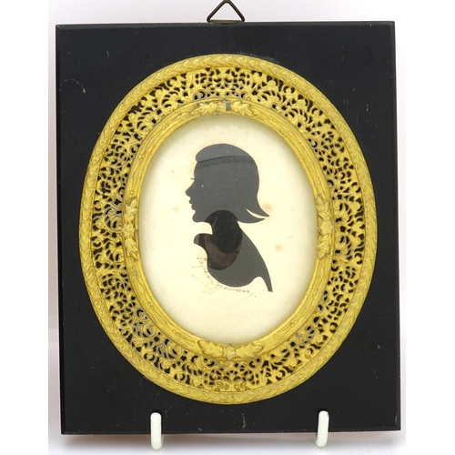 2520 - Pair of oval silhouettes housed in ebonised frames with good quality gilt metal apertures, the silho... 