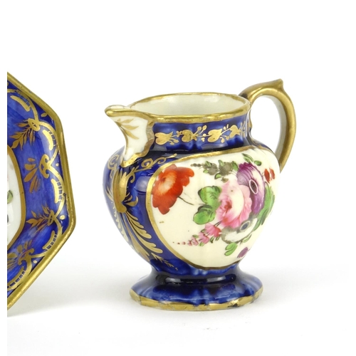 446 - 19th century miniature sample jug and basin, hand painted with flowers onto a cobalt blue ground, po... 