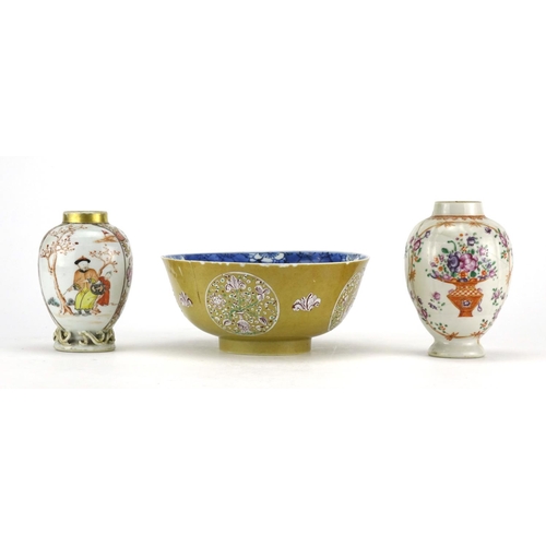 303A - Two Chinese porcelain Mandarin vases and footed bowl, hand painted with roundels of storks and flowe... 
