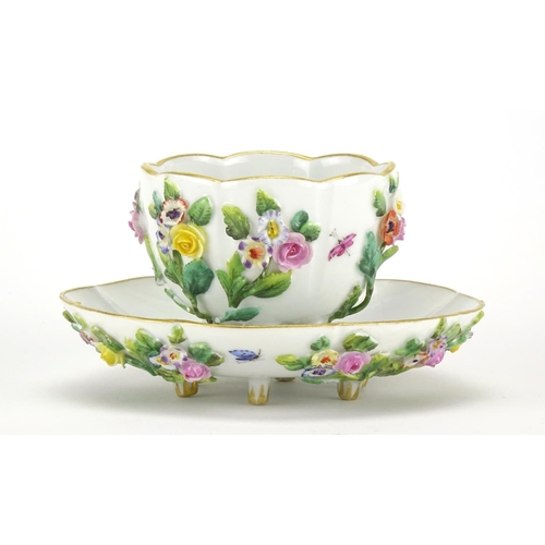431 - Meissen floral encrusted porcelain cup and saucer, hand painted with insects and flowers, cross swor... 