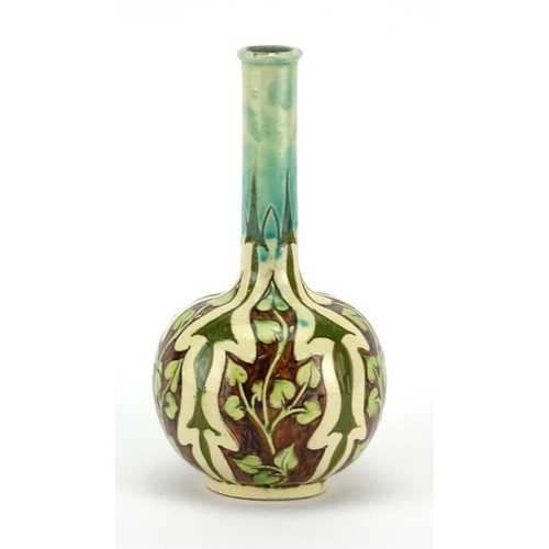 530 - Della Robbia pottery bottle vase, hand painted and incised with stylised foliage, incised marks and ... 