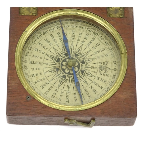 91 - Antique mahogany cased compass with brass mounts, 8cm wide