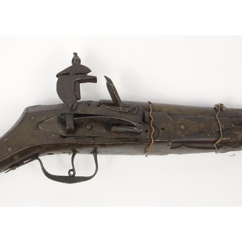 242 - Antique camel hunting flintlock musket with bone inlay, 120cm in length