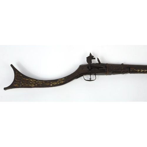 242 - Antique camel hunting flintlock musket with bone inlay, 120cm in length