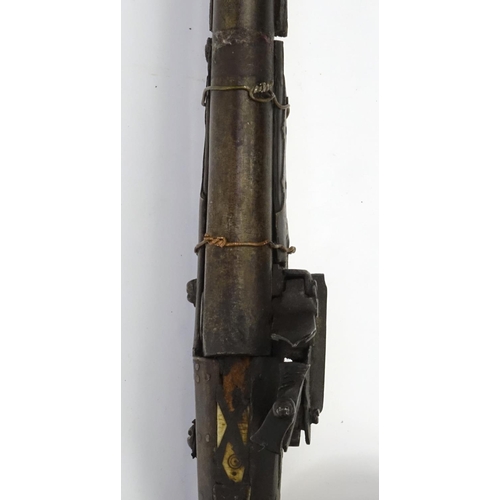 242 - Antique camel hunting flintlock musket with bone inlay, 120cm in length