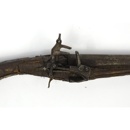 240 - Antique camel hunting flintlock musket with bone inlay, 104cm in length