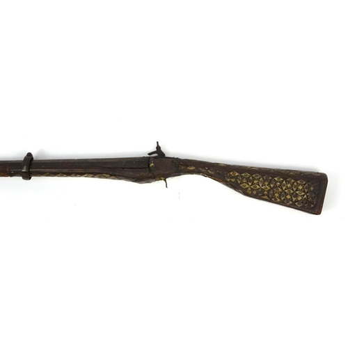 240 - Antique camel hunting flintlock musket with bone inlay, 104cm in length