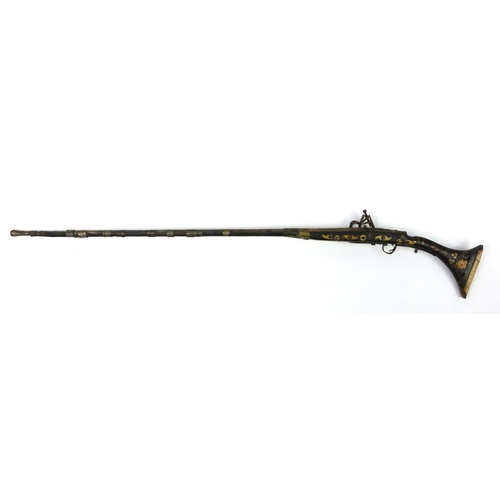 241 - Antique camel hunting flintlock musket with bone inlay, 159cm in length