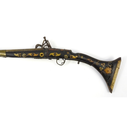 241 - Antique camel hunting flintlock musket with bone inlay, 159cm in length