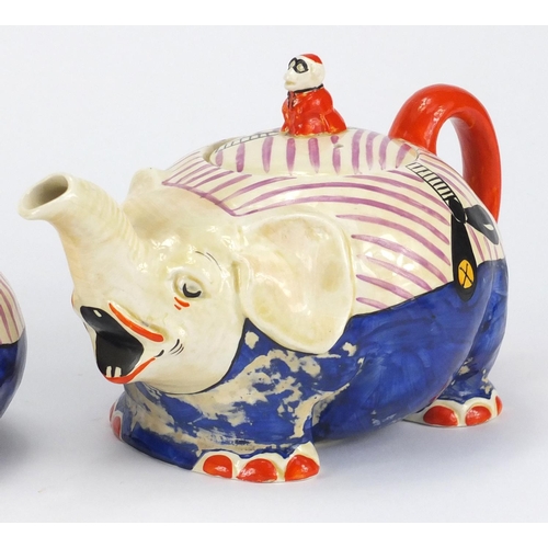516 - 1920's Royal Venton Ware elephant design novelty three piece pottery tea set, the teapot 13.5cm high