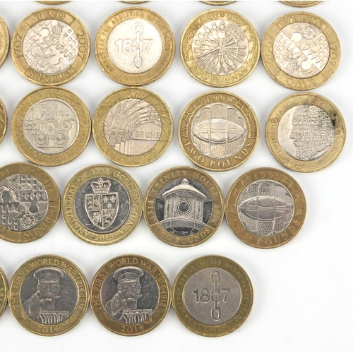 2573 - Collection of Elizabeth II two pound coins, with various designs including The Commonwealth Games