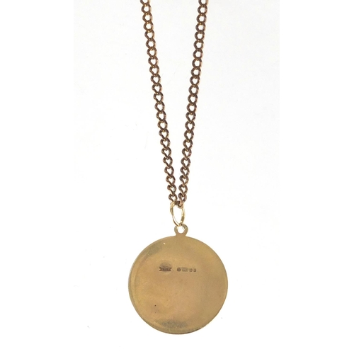 2634 - 9ct gold St Christopher pendant on a 9ct gold necklace, the pendant 2.6cm in diameter, approximate w... 