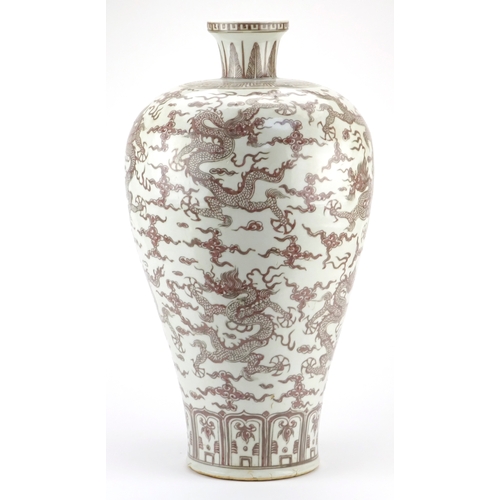 285 - Large Chinese porcelain iron red Meiping vase, hand painted with dragons amongst clouds chasing the ... 