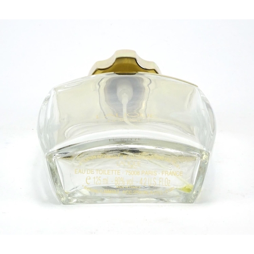 2272 - Lalique frosted and clear glass perfume bottle, internally moulded with a lions head, 13.5cm high