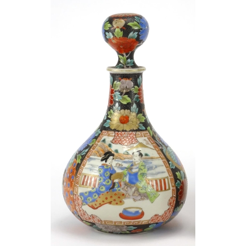 2181 - Pair of Japanese porcelain decanters,  hand painted with figures and flowers, each 24.5cm high