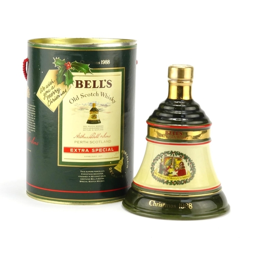 2381 - Bells Christmas 1988 whisky decanter with contents and box