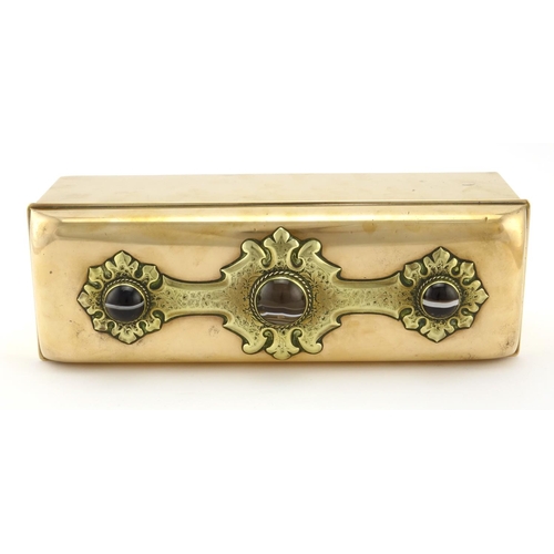 557 - Scottish Arts & Crafts copper casket, the hinged lid having applied brass panel inset with agates, t... 