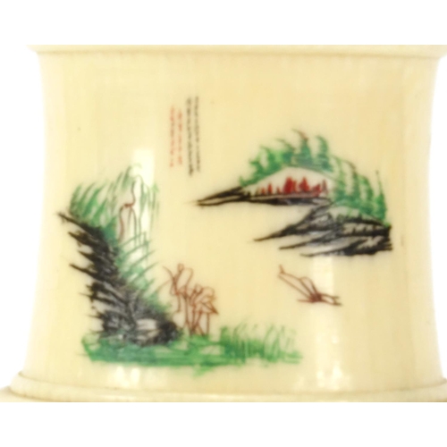 352 - Pair of Chinese turned ivory vases engraved with cranes amongst pine trees and calligraphy, each 14.... 