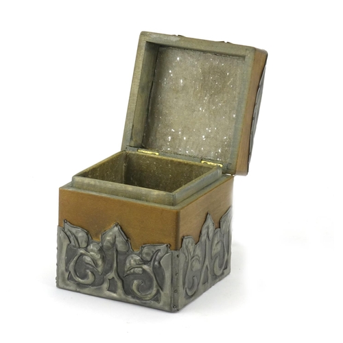 567 - Arts & Crafts wooden tea caddy with stylised pewter overlay, the hinged lid with inset Ruskin panel,... 