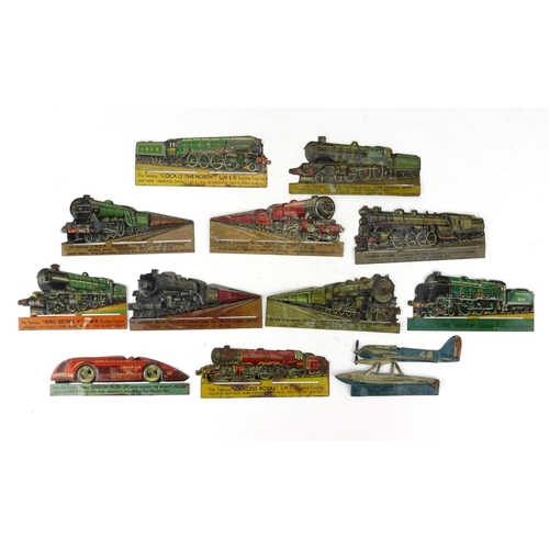66 - Group of vintage tin train and aviation markers, each approximately 13.5cm wide