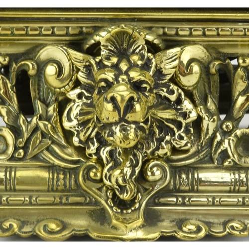 21 - Victorian brass desk stand with hinged lid, lion mask and pierced body, registered number 1387 to th... 