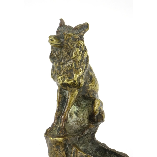 14 - Patinated bronze inkwell mounted with a wolf, impressed F Pautrot, 11.5cm high
