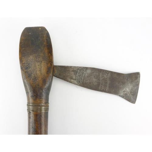 374 - Tribal wooden axe, possibly from Congo, the steel blade with incised decoration, 34cm in length