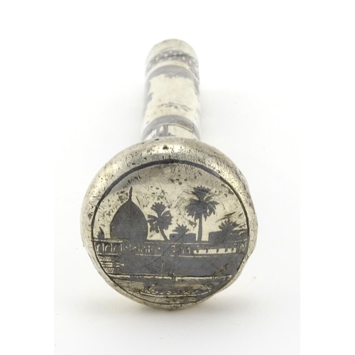618 - Silver and niello work parasol handle, decorated with figures, boats and trees, 14cm in length