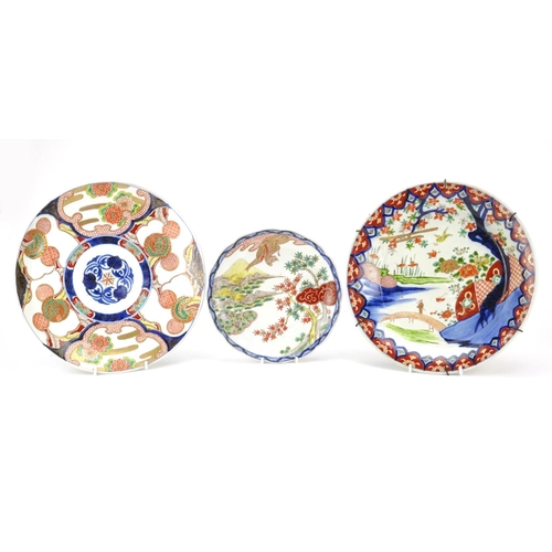 316 - Three Japanese porcelain dishes, each hand painted in the Imari palette, two with birds and trees, t... 