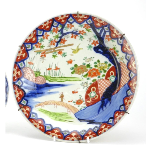 316 - Three Japanese porcelain dishes, each hand painted in the Imari palette, two with birds and trees, t... 