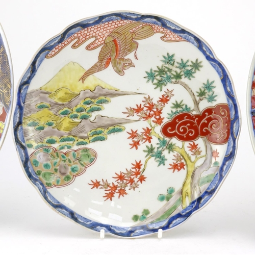 316 - Three Japanese porcelain dishes, each hand painted in the Imari palette, two with birds and trees, t... 