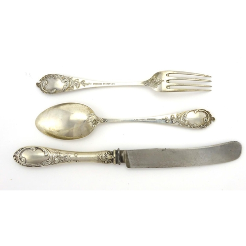 626 - German 800 grade silver knife, fork and spoon set, by R.Plappert, the knife 22cm in length, approxim... 