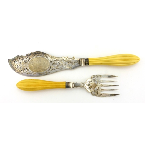 632 - Pair of Victorian fish servers, with ivory handles and silver plated blades engraved with a coastal ... 