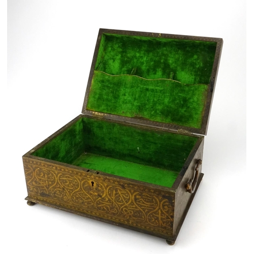 398 - Indo Persian lacquered brass casket with twin handles, engraved with Islamic script, the hinged lid ... 