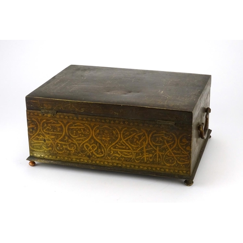 398 - Indo Persian lacquered brass casket with twin handles, engraved with Islamic script, the hinged lid ... 