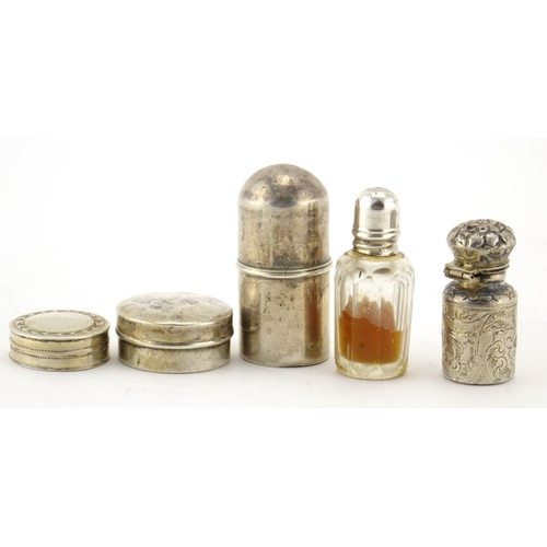 598 - Four Georgian and later silver scent bottles and pill boxes, the largest 4.5cm high, approximate wei... 