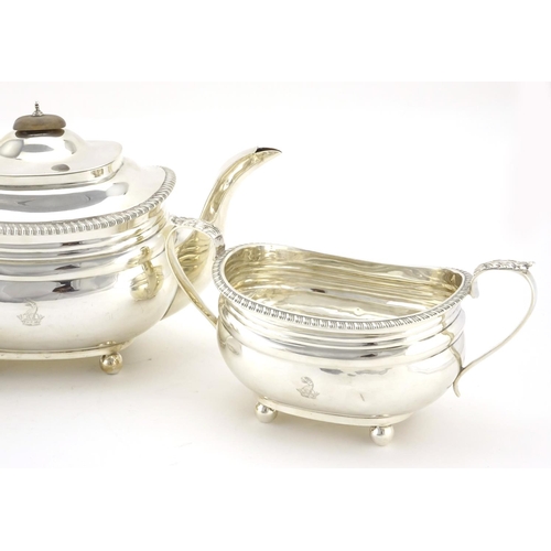 581 - Silver three piece tea service with ball feet, by Goldsmiths & Silversmiths Company, London 1918, th... 