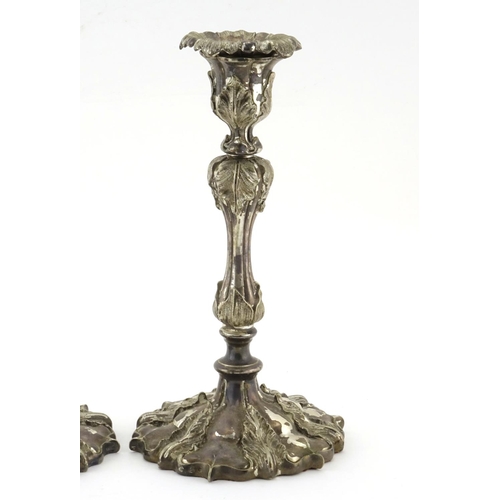 636 - Pair of Elkington & Co silver plated candlesticks, decorated in relief with acanthus leaves, 25.5cm ... 