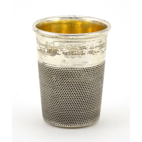 604 - Silver thimble cup with gilt interior, by Charles Horner, Chester 1948, 5.5cm high, approximate weig... 