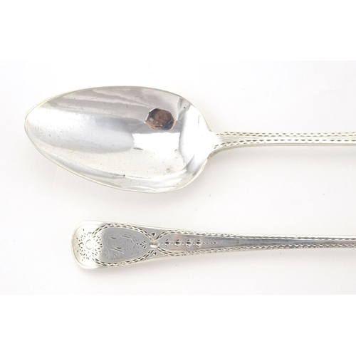 627 - Pair of Georgian silver tablespoons, with engraved decoration, by C Hougham, London 1789, 21.5cm in ... 