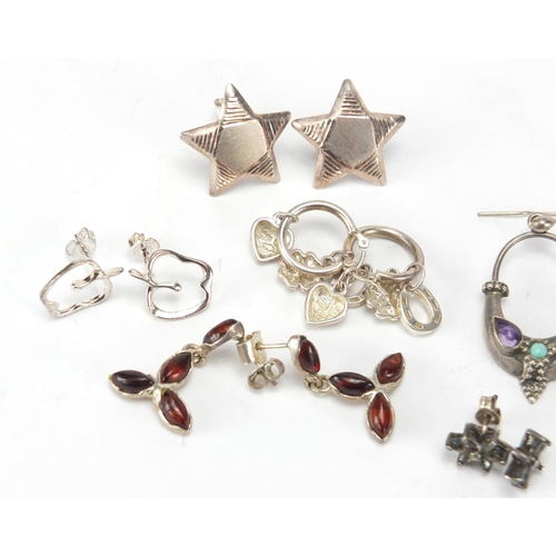 202 - Six pairs of silver earrings, some set with semi precious stones, approximate weight 20.5g