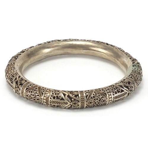 454 - Chinese silver coloured metal Filigree bangle, 9cm in diameter, approximate weight 51.0g