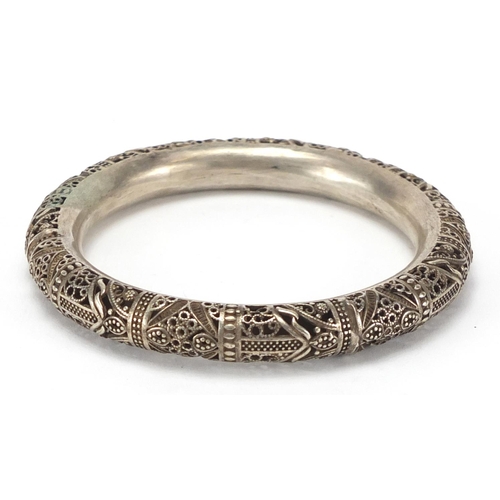 454 - Chinese silver coloured metal Filigree bangle, 9cm in diameter, approximate weight 51.0g