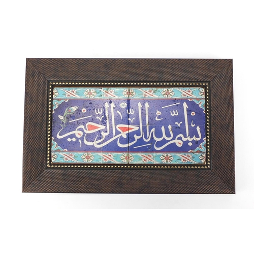 608 - Turkish pottery tiles decorated with script, framed, overall 28cm x 18cm