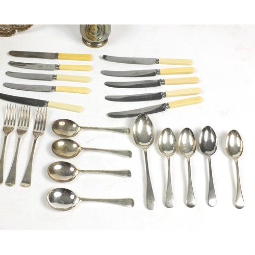 166 - Silver plate including a bread basket with swing handle and cutlery, some with ivorine handles