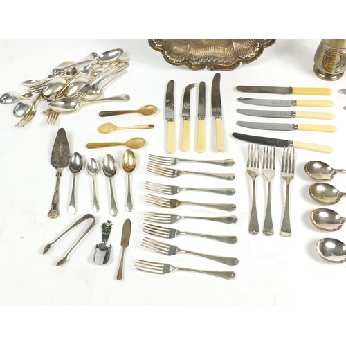 166 - Silver plate including a bread basket with swing handle and cutlery, some with ivorine handles