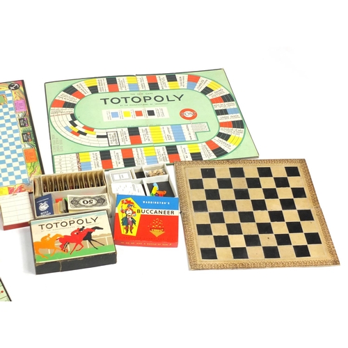184 - Vintage board games including Monopoly, Totopoly and a wooden chess set